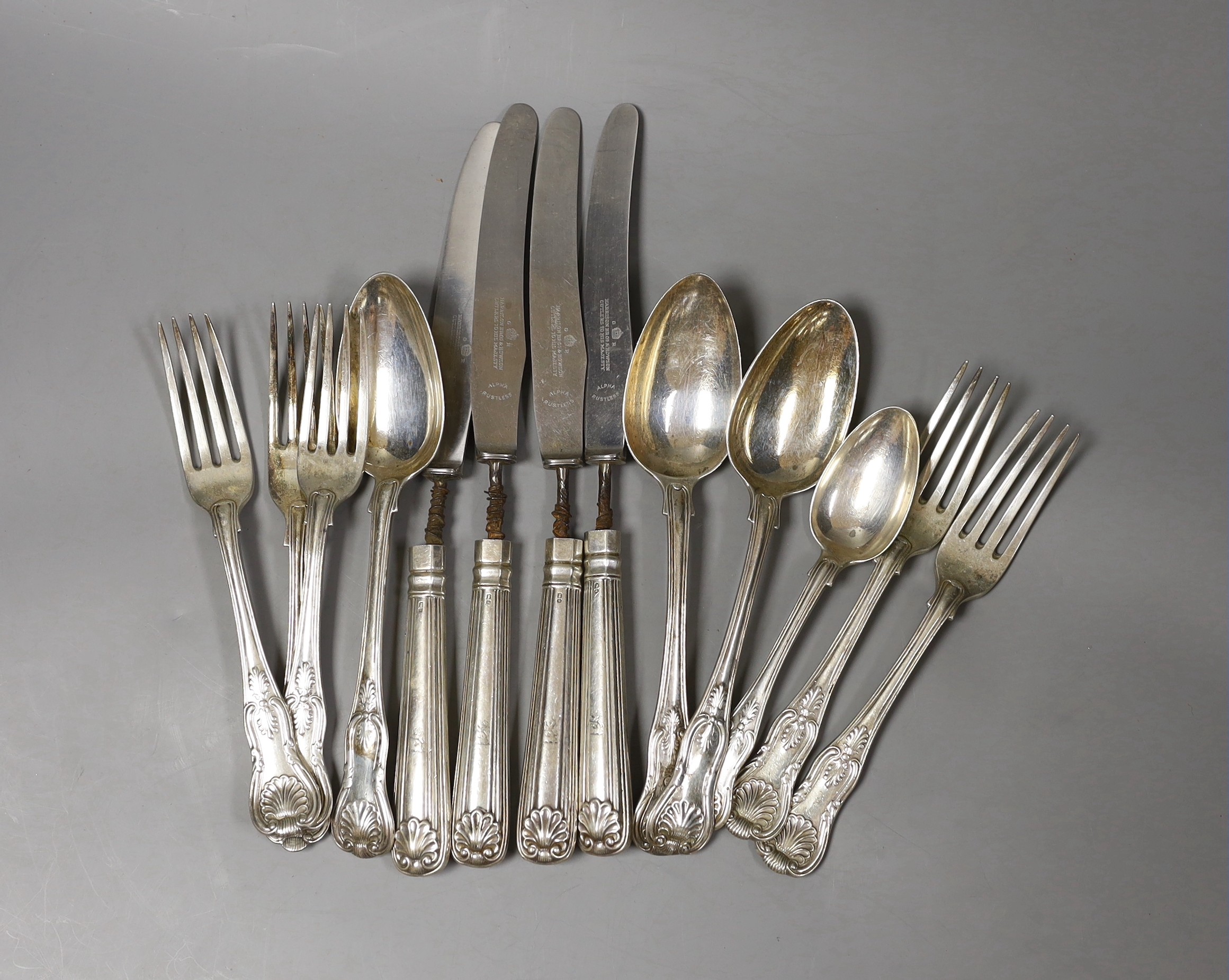Thirteen items of 19th century silver cutlery, including Kings pattern and fiddle and shell, various dates and makers